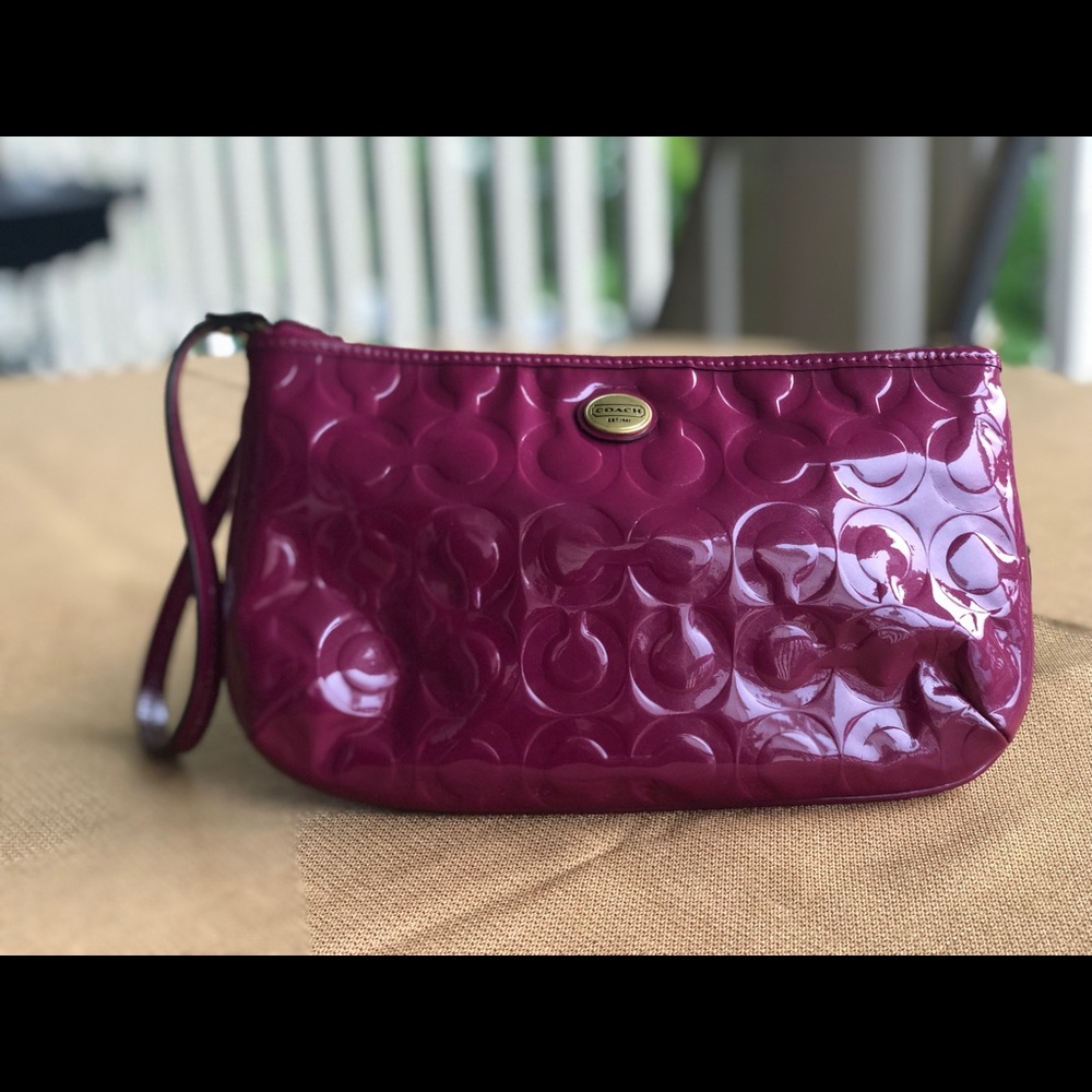 Berry patent leather Coach wristlet
